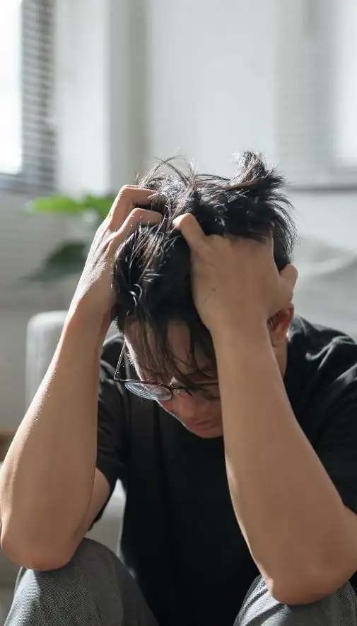 Image of upset man because of erectile dysfunction symptoms Cambridge